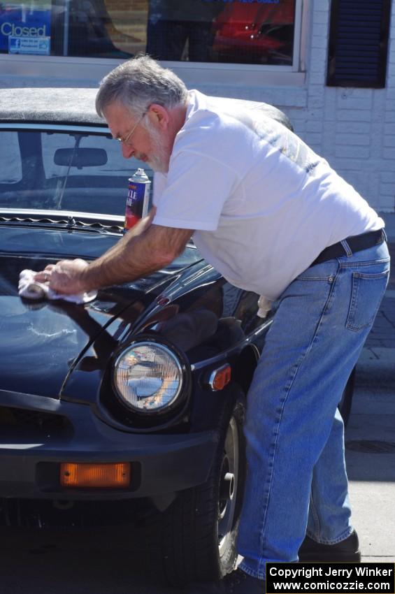 Dwight McCullough polishes his MGB