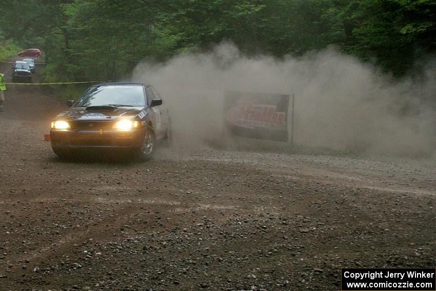 Don Kennedy / Keith Kennedy Subaru Impreza gets wide on SS6.