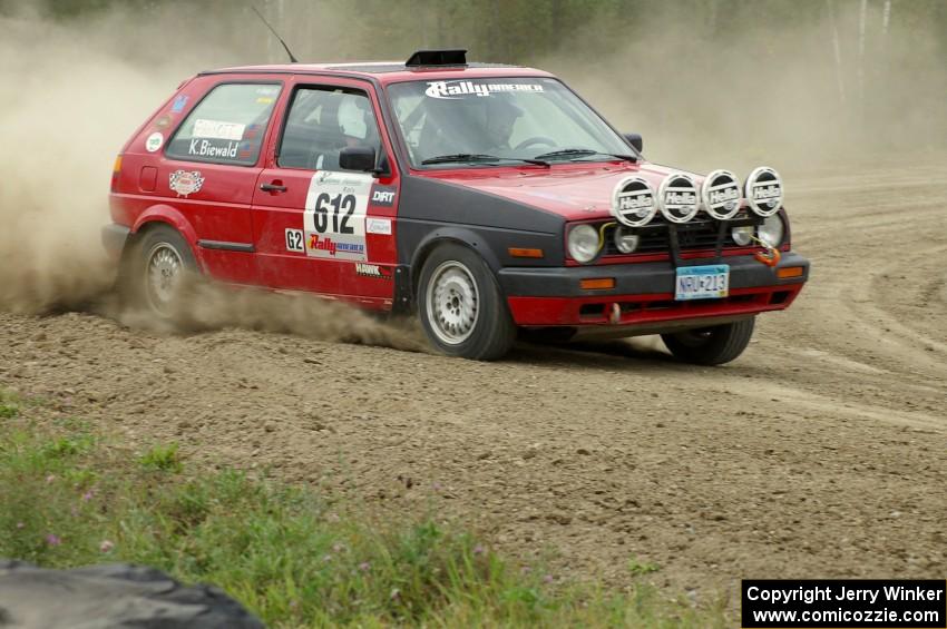 Karl Biewald / Scott Parrott VW GTI slings gravel on SS1 at the Bemidji Speedway.