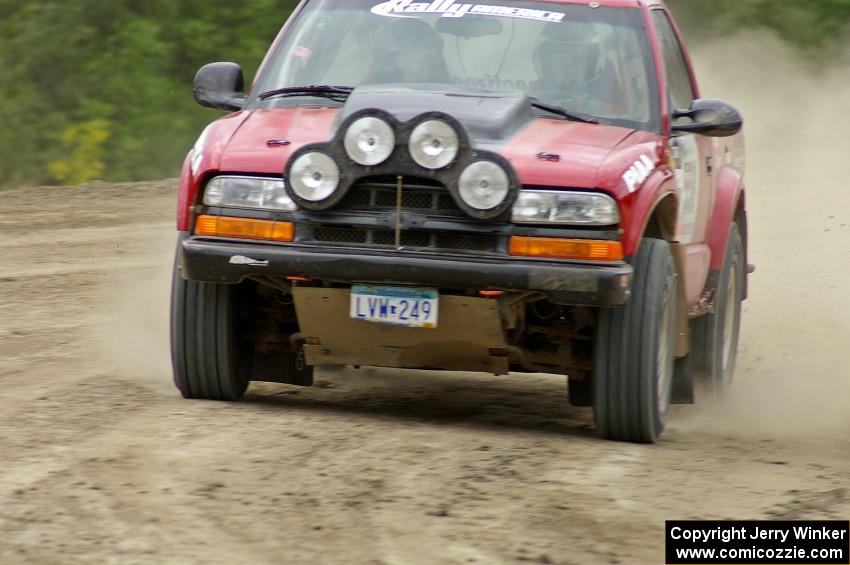 Jim Cox / Brent Carlson Chevy S-10 rockets through the high bank on SS1 at Bemidji Speedway.