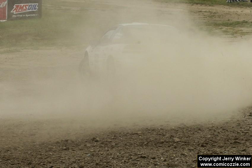 Paul Ritchie / Drew Ritchie Mitsubishi Eclipse GSX in shrouded by a cloud of dust on SS1.