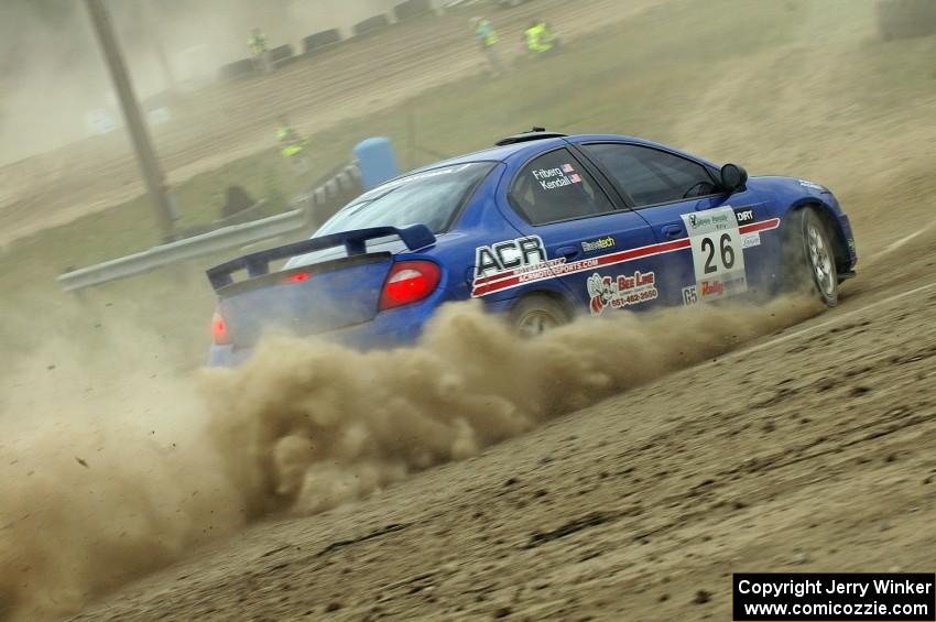 Cary Kendall / Scott Friberg Dodge SRT-4 slings gravel on SS1 at the Bemidji Speedway.