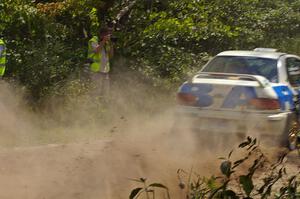 Pete Kuncis snaps a shot of the Henry Krolikowski / Cindy Krolikowski Subaru Impreza on SS9.