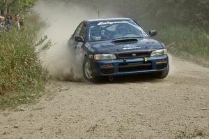 Don Kennedy / Matt Kennedy Subaru Impreza prepare for a 90-left on SS9.