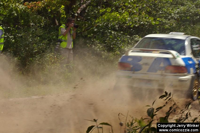 Pete Kuncis snaps a shot of the Henry Krolikowski / Cindy Krolikowski Subaru Impreza on SS9.