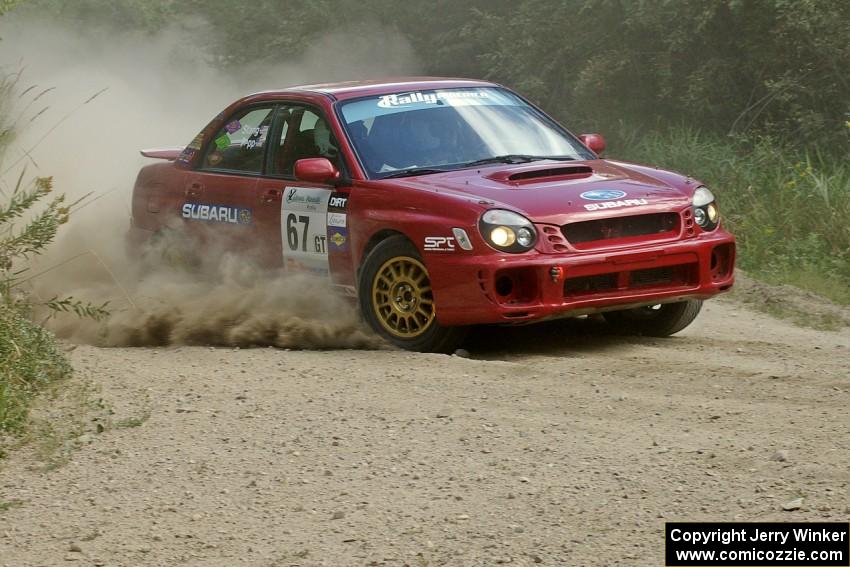 Bryan Pepp / Jerry Stang Subaru WRX prepares for a hard left on SS9.