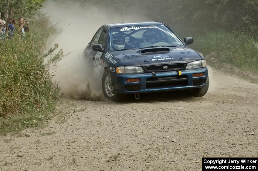 Don Kennedy / Matt Kennedy Subaru Impreza prepare for a 90-left on SS9.