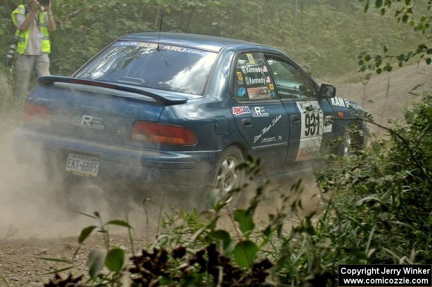 Don Kennedy / Matt Kennedy Subaru Impreza fly through a 90-left on SS9.