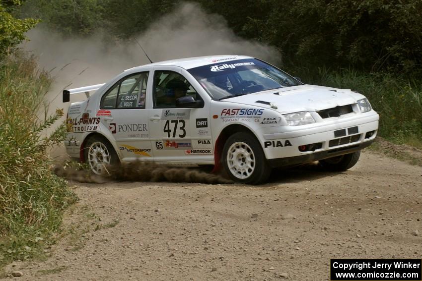 Lars Wolfe / Jeff Secor VW Jetta Turbo comes into the spectator corner on SS9.