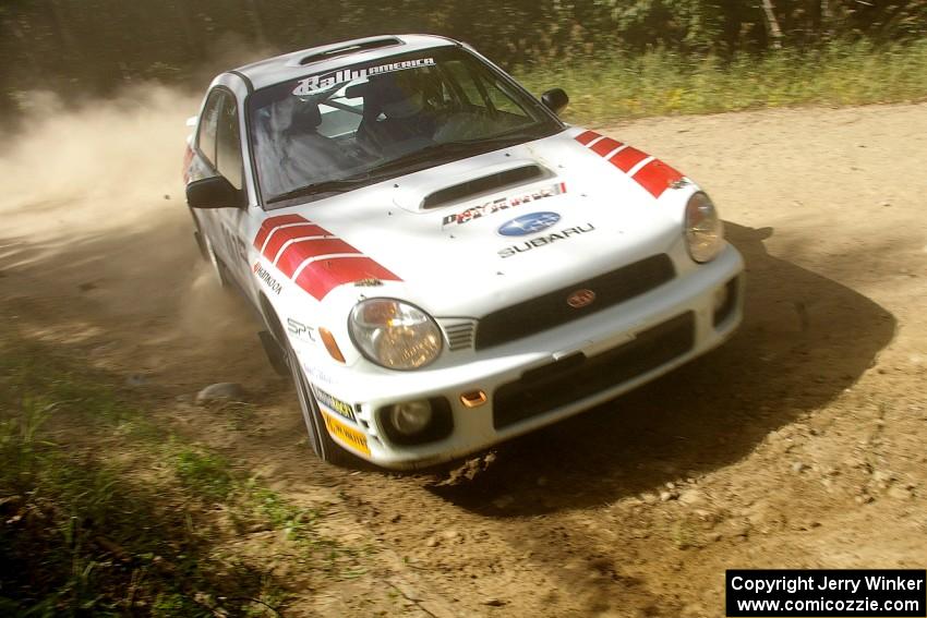 Dave Hintz / John Dillon Subaru WRX at a 90-right on SS12.