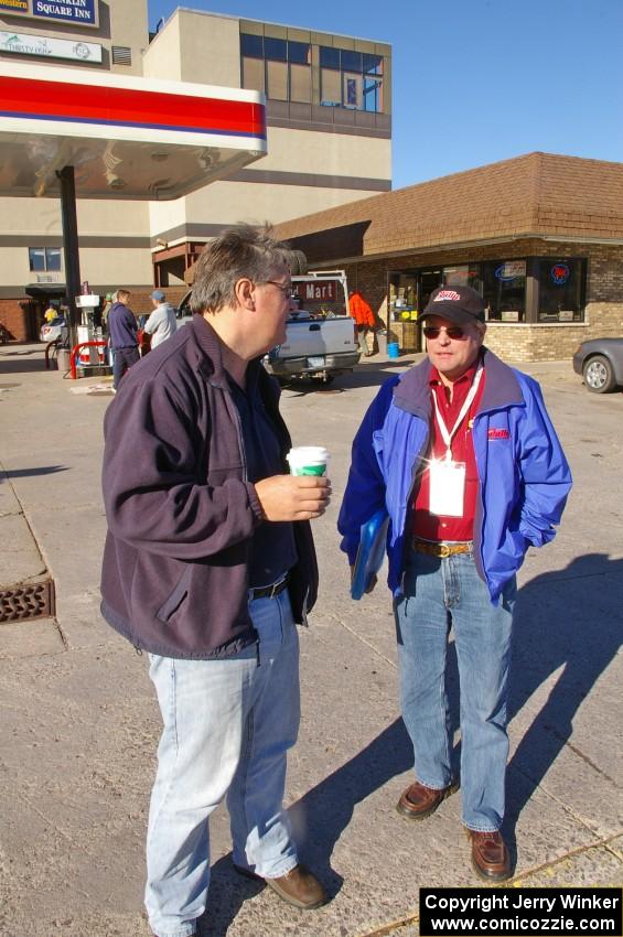 J.B. Niday and Mark Williams have a curbside chat outside of the headquarters the morning before LSPR.