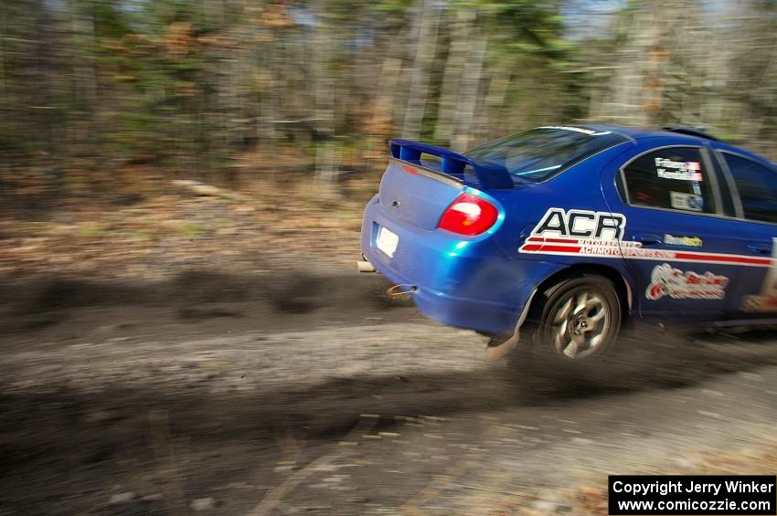 Cary Kendall / Scott Friberg rocket down a straight in their Dodge SRT-4 on SS1.