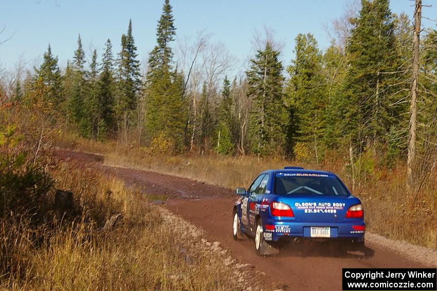 Travis Hanson / Terry Hanson Subaru WRX on SS1.