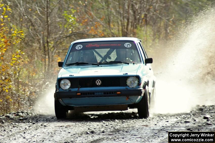 Tom Burress / Don Burress VW Rabbit hits a puddle on SS1.