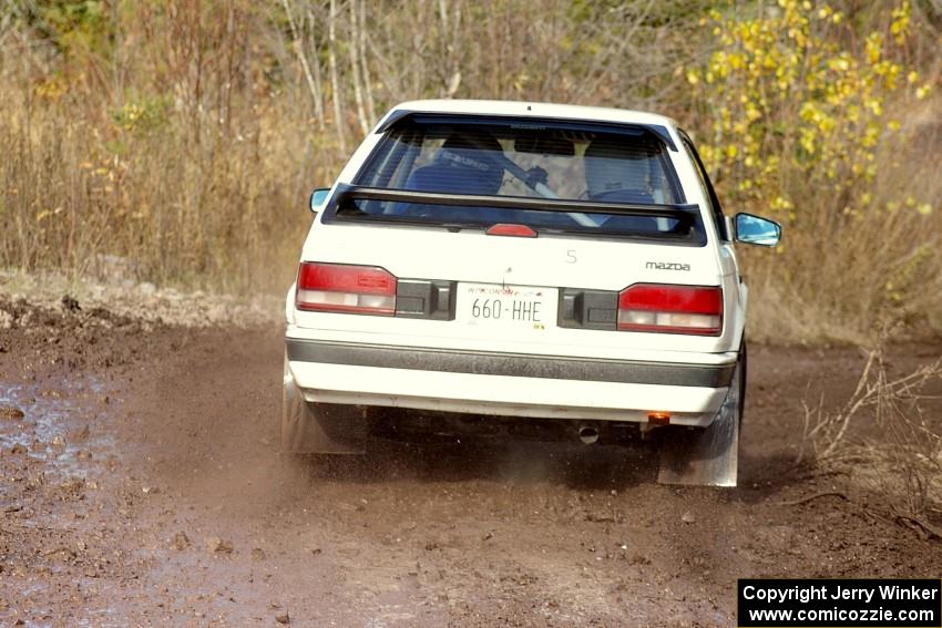 Erik Zenz / Dave Parps Mazda 323GTX on SS1.