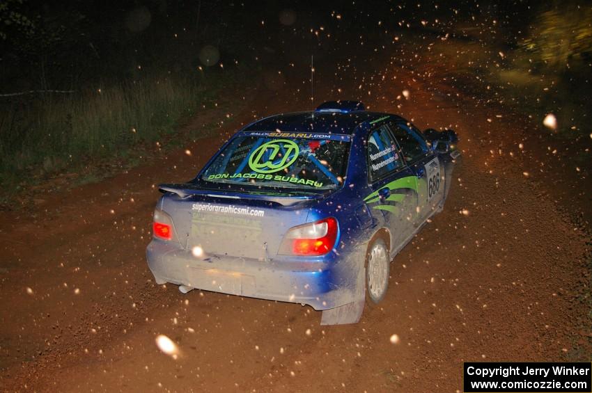 Heath Nunnemacher / Heidi Nunnemacher Subaru WRX blast gravel at the final corner of SS4, Echo Lake 1.