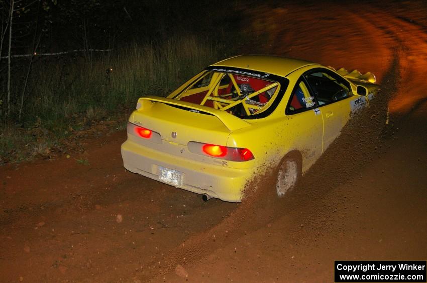 Evan Moen / Dan Victor in their Acura Integra Type-R sling gravel on the final corner of SS4, Echo Lake 1.