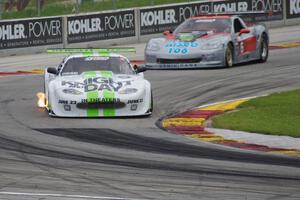 Tomy Drissi's Jaguar XKR ahead of R.J. Lopez's Chevy Corvette