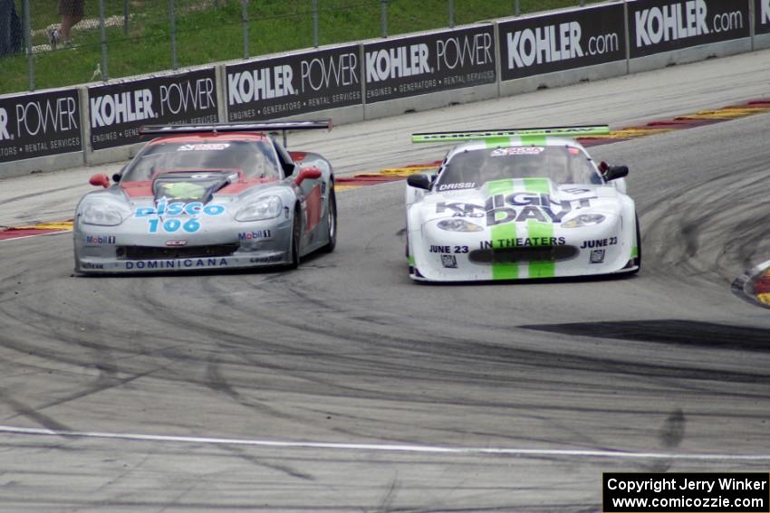 Tomy Drissi's Jaguar XKR gets the inside line in turn five on R.J. Lopez's Chevy Corvette