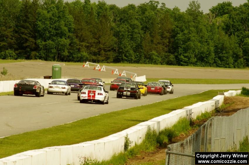 GT, Touring and Spec Miata field get the green at turn one