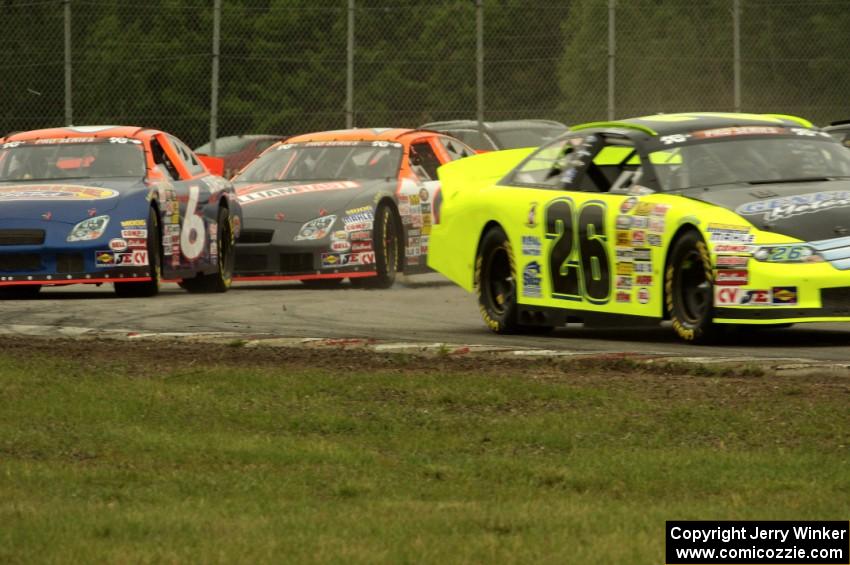 Cars at the first turn after the green