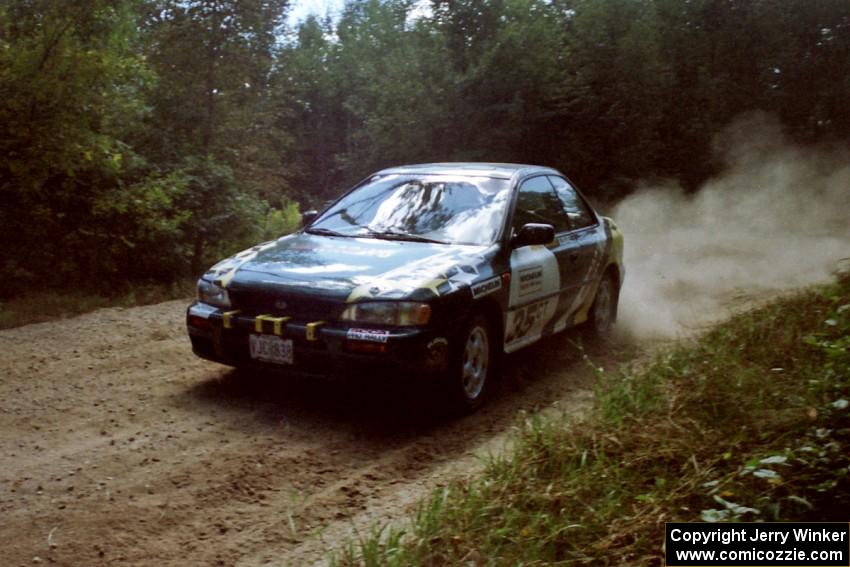 Lee Shadbolt / Paul Eklund Subaru Impreza near the start of SS8 (Thorpe Tower).