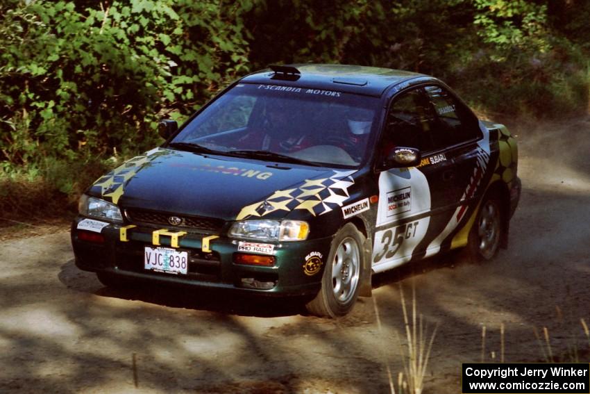 Lee Shadbolt / Paul Eklund Subaru Impreza at the spectator point on SS10 (Kabekona).