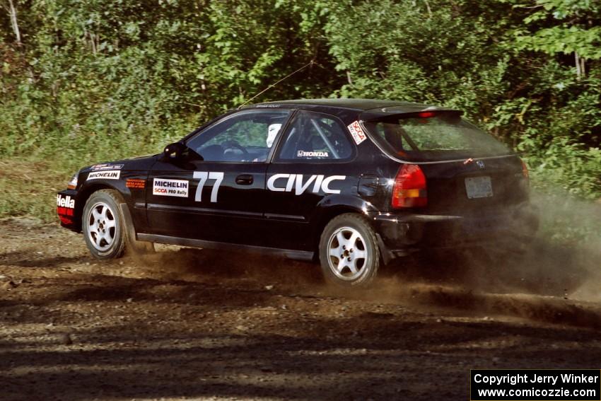 Bryan Hourt / Pete Cardimen Honda Civic at the spectator point on SS10 (Kabekona).