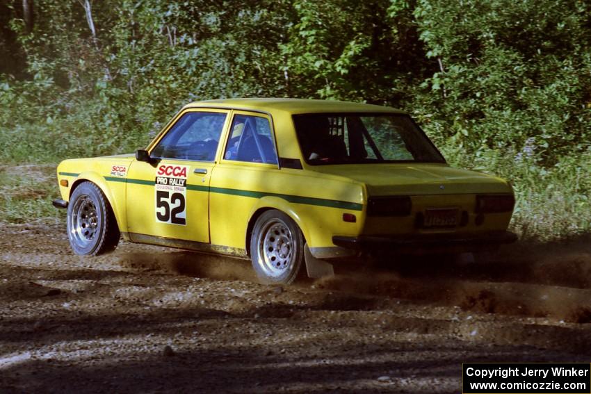 Alex Timmermans / John Golden Datsun 510 at the spectator point on SS10 (Kabekona).