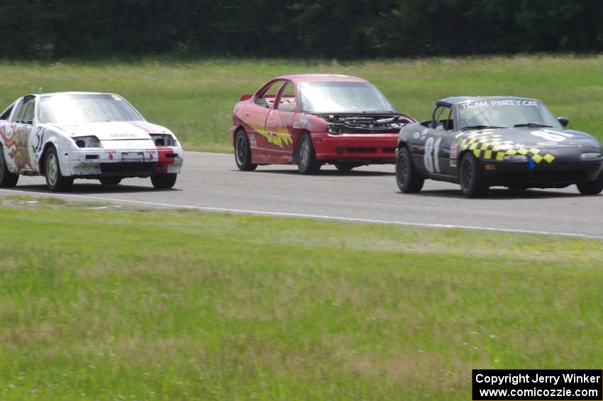 Team Party Cat Mazda Miata, NNM Motorsports Dodge Neon and Team Polska Kielbasa Nissan 280ZX