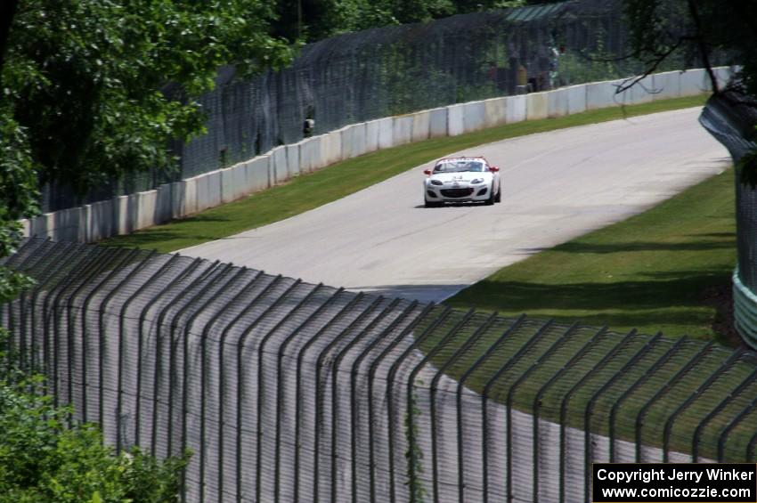 Christian Szymczak's Mazda MX-5 comes into turn 12