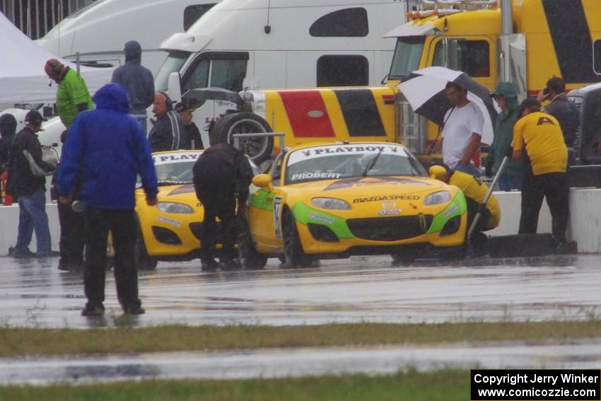 Tim Probert and Ara Malkhassian get rain tires on their Mazda MX-5s