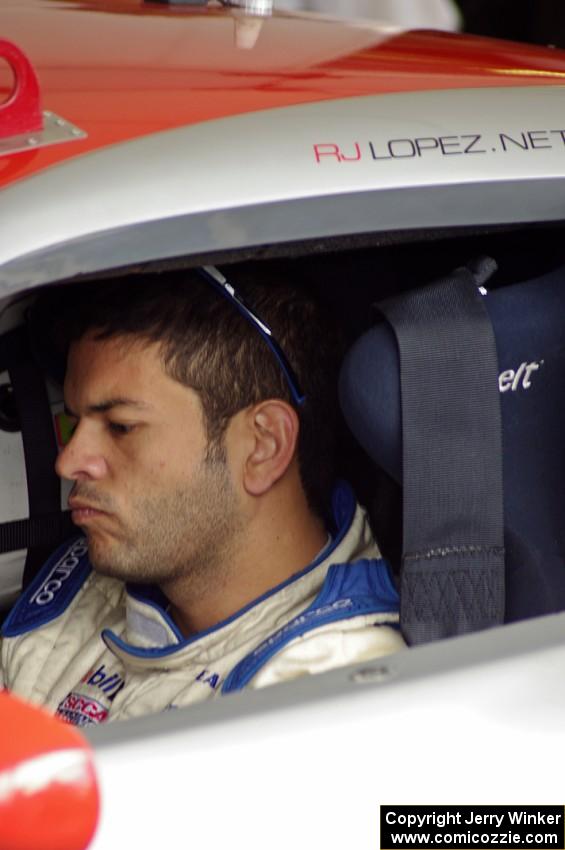 R.J. Lopez sits in his Chevy Corvette before qualifying