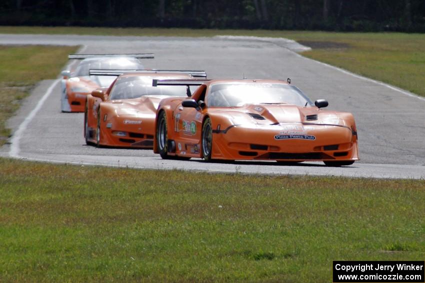 The Chevy Corvettes of Bobby Sak, Jim Derhaag and Simon Gregg battle early on