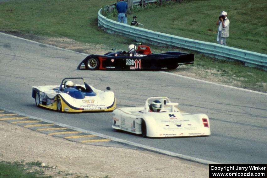 Paul Okean's Swift DB-2 ahead of Jonathan Holtzman's Lola T-92/JH1 as Tom Harrer's Swift DB-5 spins