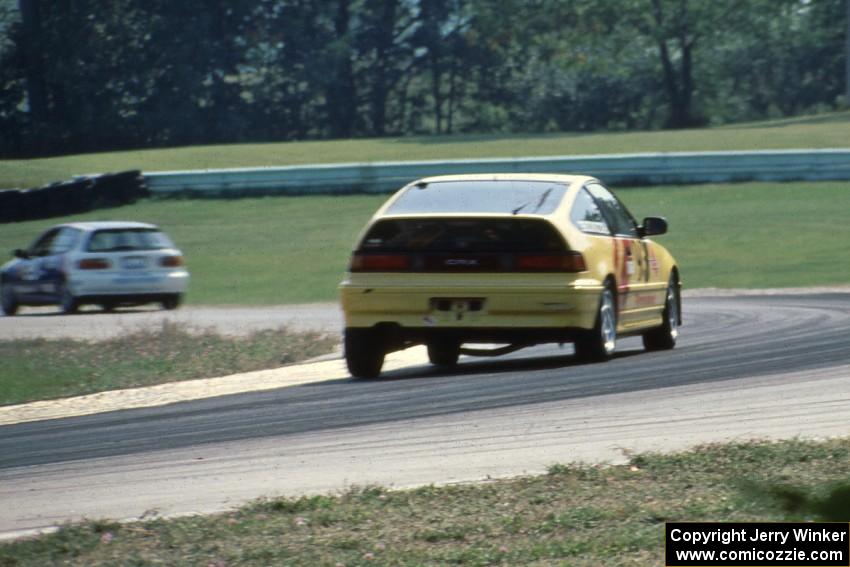 Todd Freeman / Jon Klapperick Honda CRX Si follows the Scott Kronn / Bob Roth Honda Civic Si