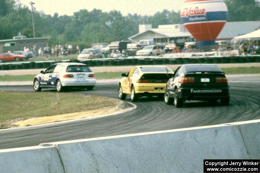 Scott Kronn / Bob Roth Honda Civic Si, Todd Freeman / Jon Klapperick Honda CRX Si and Mark Behm / Phil Pate VW Corrado