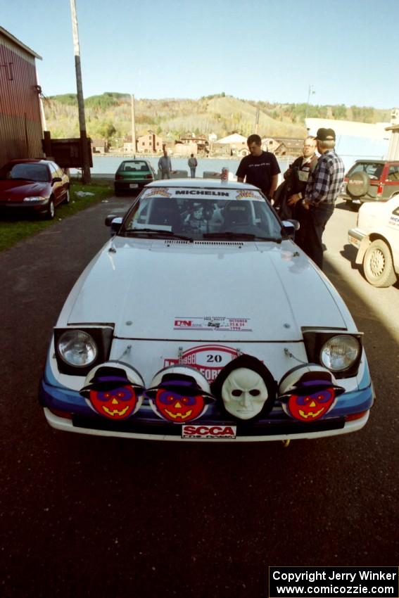 Mike Hurst / Rob Bohn Mazda RX-7 at parc expose outside Dee Stadium.