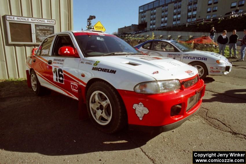 David Summerbell / Michael Fennell Mitsubishi Lancer Evo II at parc expose outside Dee Stadium.