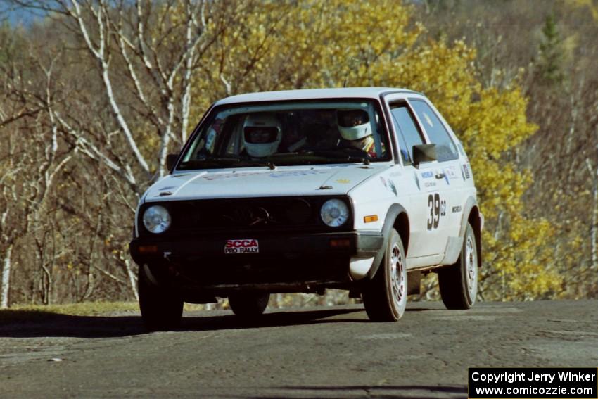 Wayne Prochaska / Annette Prochaska VW Golf at speed on SS13, Brockway I.