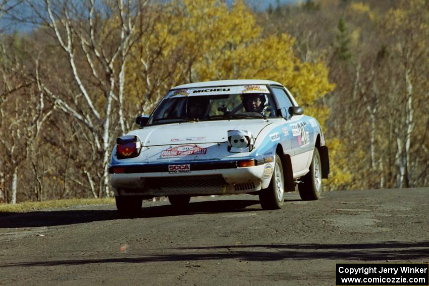 Mike Hurst / Rob Bohn Mazda RX-7 at speed on SS13, Brockway I.