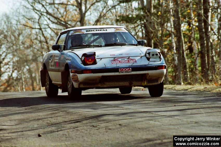 Mike Hurst / Rob Bohn Mazda RX-7 at speed on SS14, Brockway II.