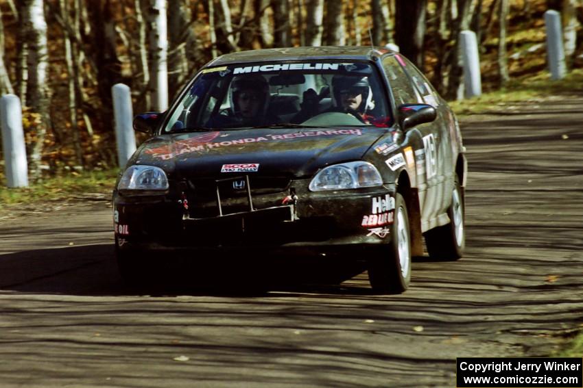 Jay Kowalik / Mike Dunn Honda Civic CVT at speed on SS14, Brockway II.