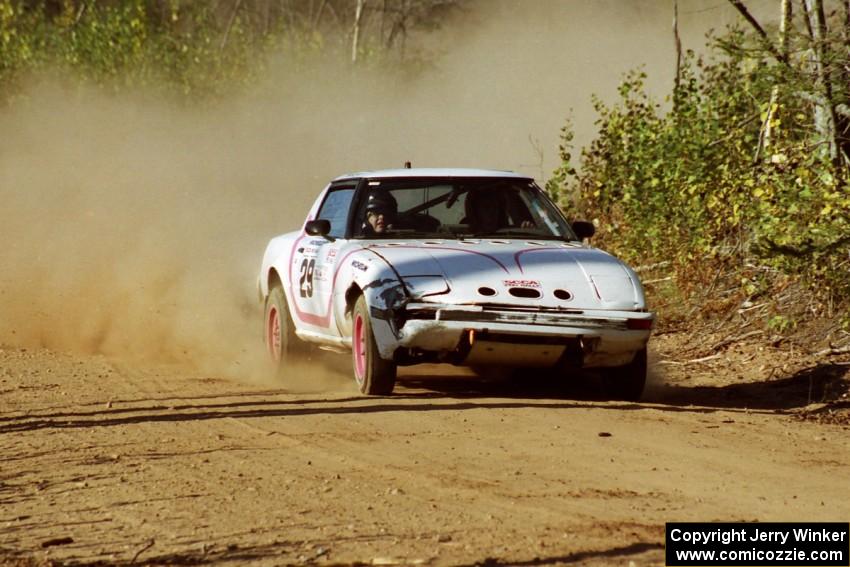 Craig Kazmierczak / Diane Sargent Mazda RX-7 at speed near the finish of SS15, Gratiot Lake II.