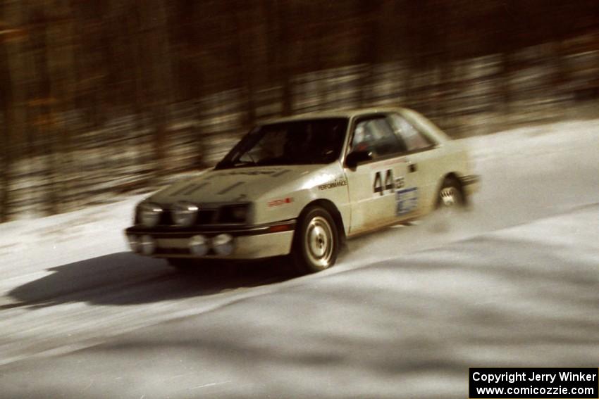 Henry Krolikowski / Cindy Krolikowski at speed in their Dodge Shadow on SS3.