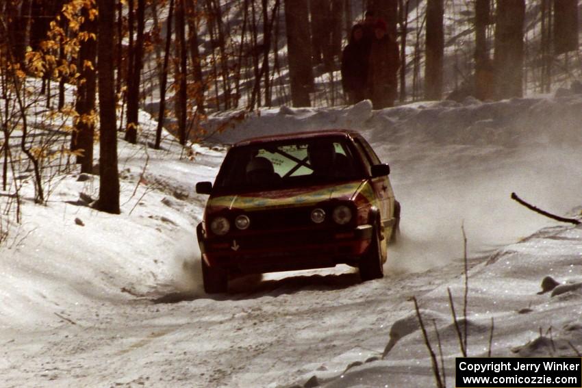 Karl Scheible / Gail McGuire blast down a straight on SS3 in their VW GTI.