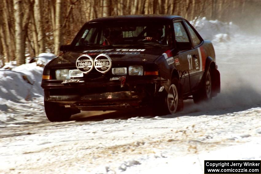 Lynn Dillon / J.B. Lewis push onward with a left-front flat on their Pontiac Sunbird on the stage prior to the lunch break.