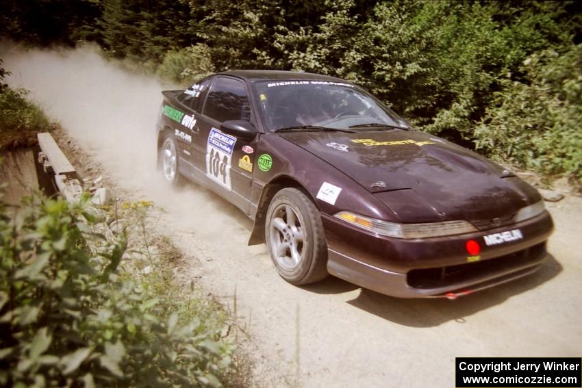 Martin Donnelly / Gavin Coyle Eagle Talon at speed over a bridge on SS5, Magalloway North.