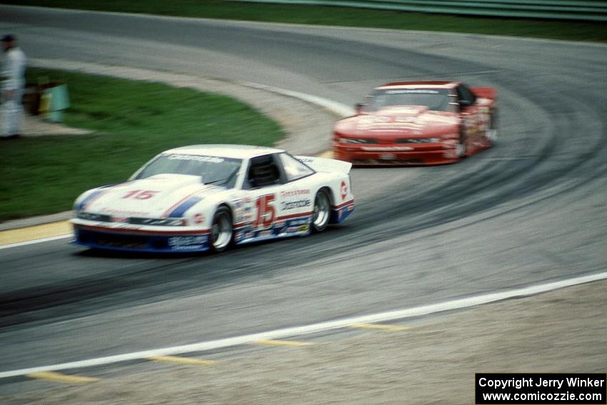 Irv Hoerr's Olds Cutlass Supreme ahead of Darin Brassfield's Olds Cutlass Supreme