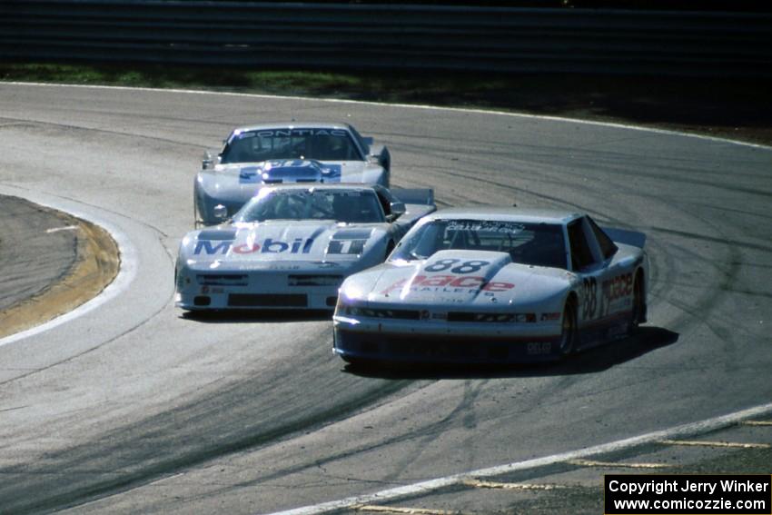 Mitch Bender's Olds Cutlass Supreme, John Heinricy's Chevy Corvette and Scott Lagasse's Pontiac Firebird GTA